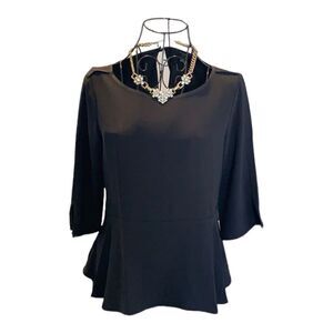 Ann Taylor black peplum petite blouse. Size SP